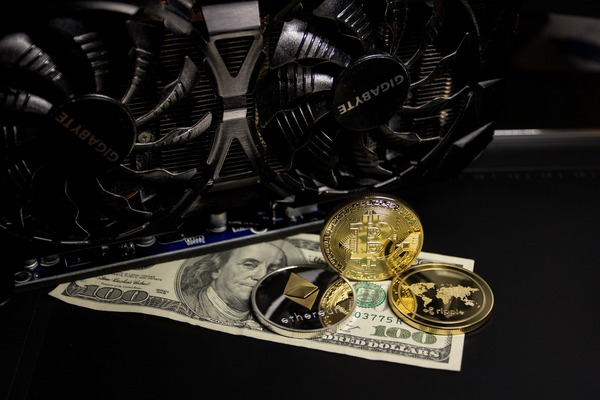 Gold coins symbolizing crypto exchange risk and rate volatility